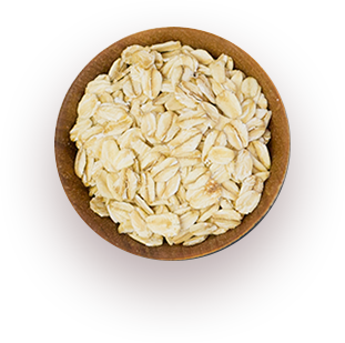 a wooden bowl of rolled oats.